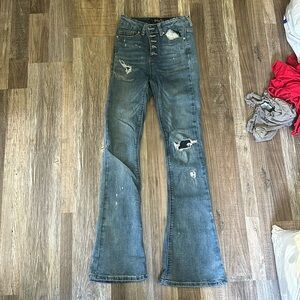 Indigo rein jeans flare leg patched holes 5 buttons
